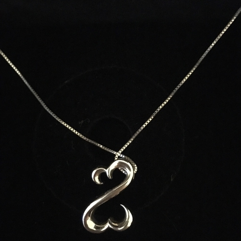 Kay’s open heart necklace